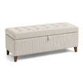 Banc de rangement en velours côtelé beige avec pieds en bois
