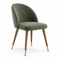 Chaise en tissu côtelé vert avec pieds en bois de noyer