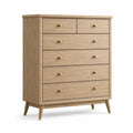 Commode en bois naturel avec poignées en métal doré